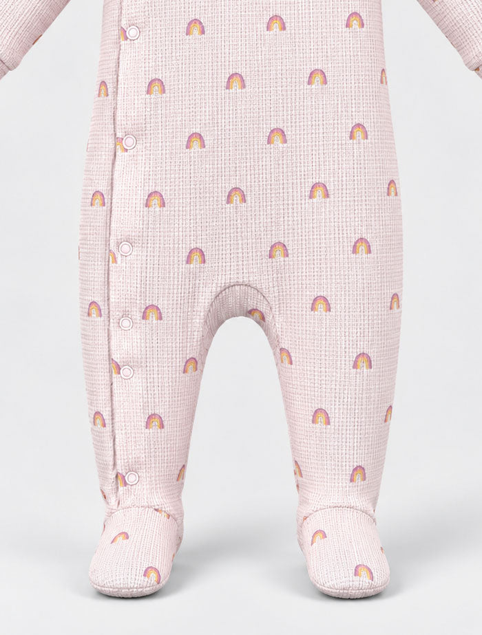 Dusty pink knitted rainbow sleep suit