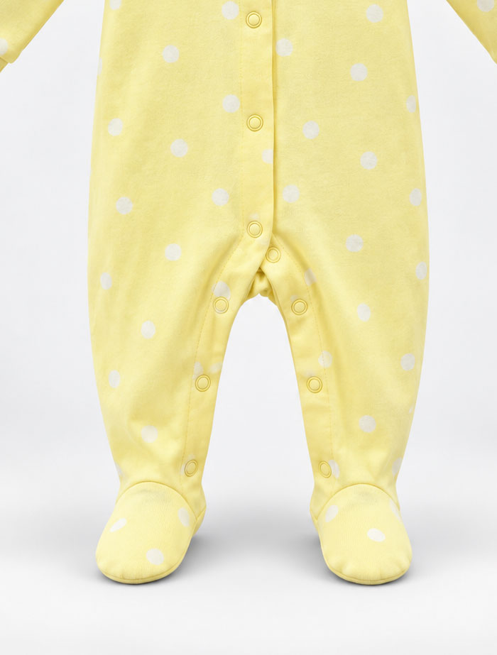Yellow dotted button sleep suit