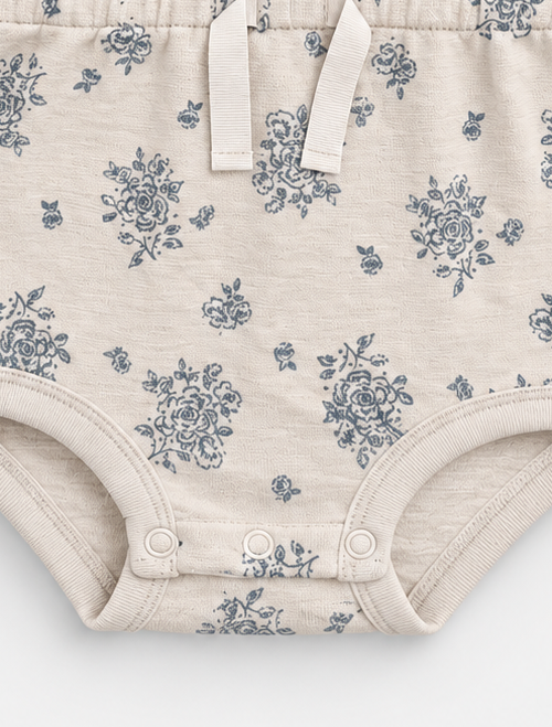 Blue floral patterned onesie