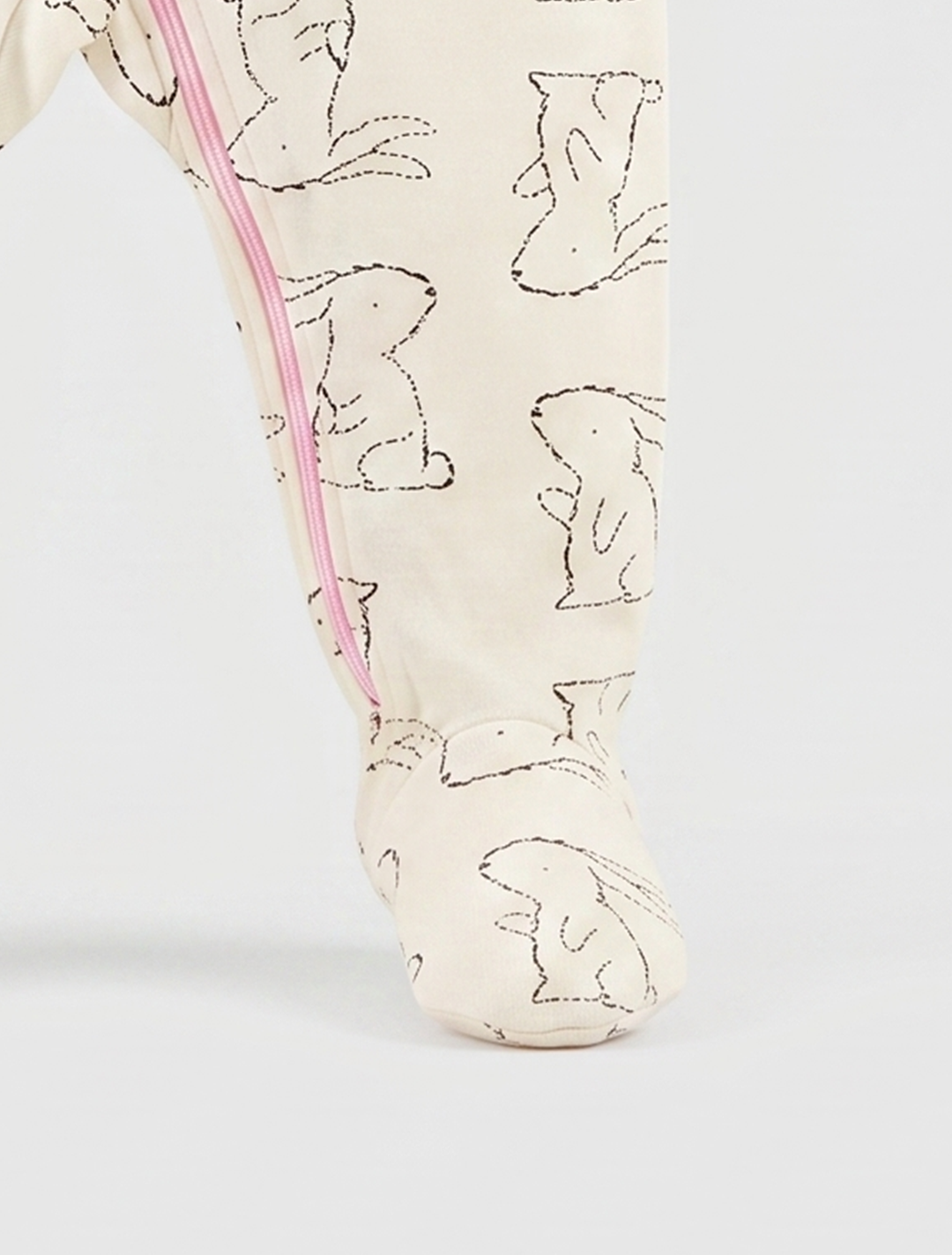 Cream bunny printed zipper sleepsuit