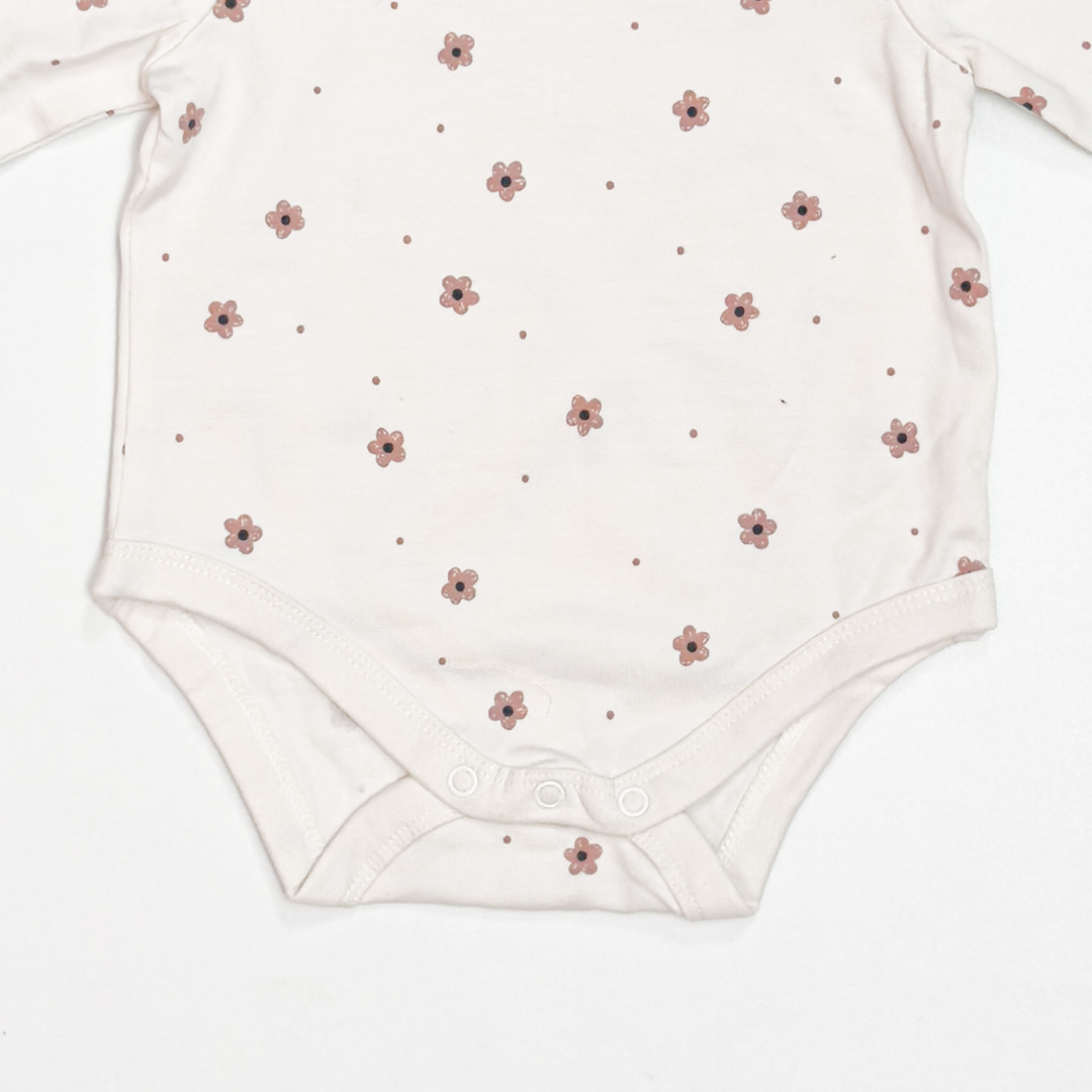 OFF WHITE FLORAL ONESIE