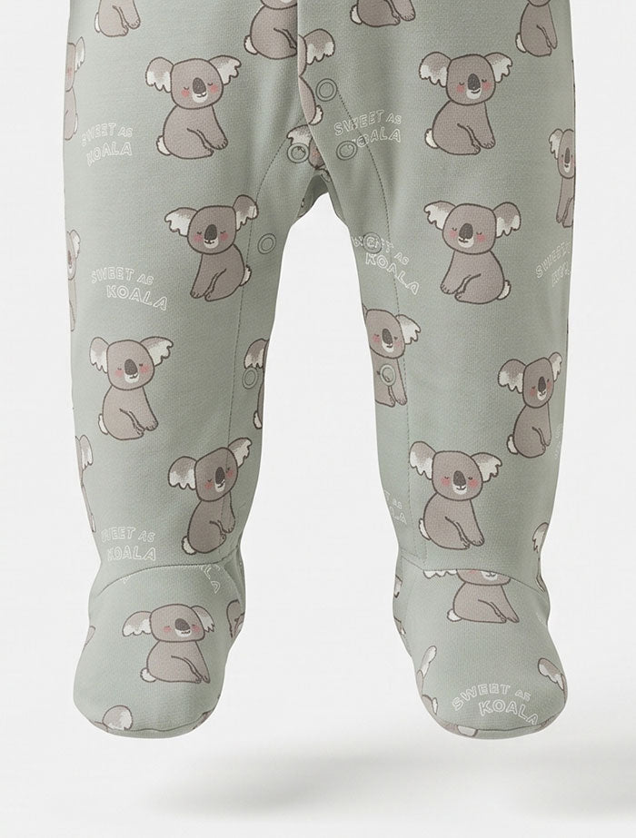 Pastel green printed button sleepsuit