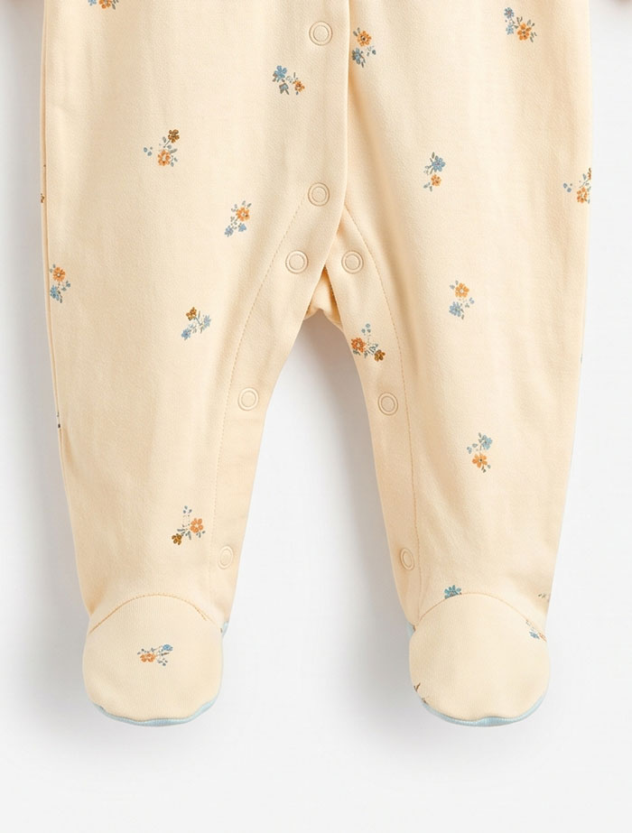 Pastel floral ruffled sleep suit