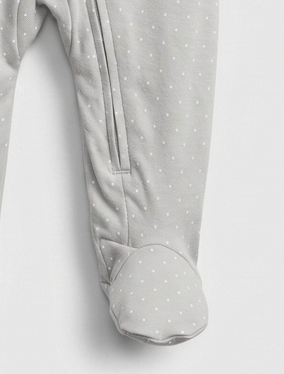 Pastel dotted zipper sleepsuit