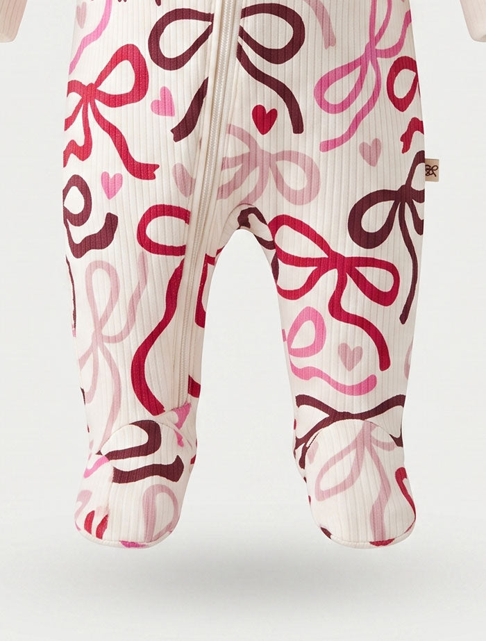 Red and pink ribbed bow printed sleep suit