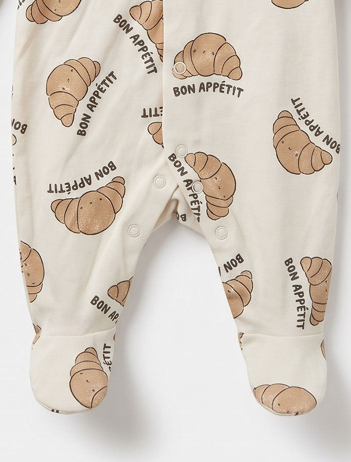 Beige croissent printed button sleepsuit