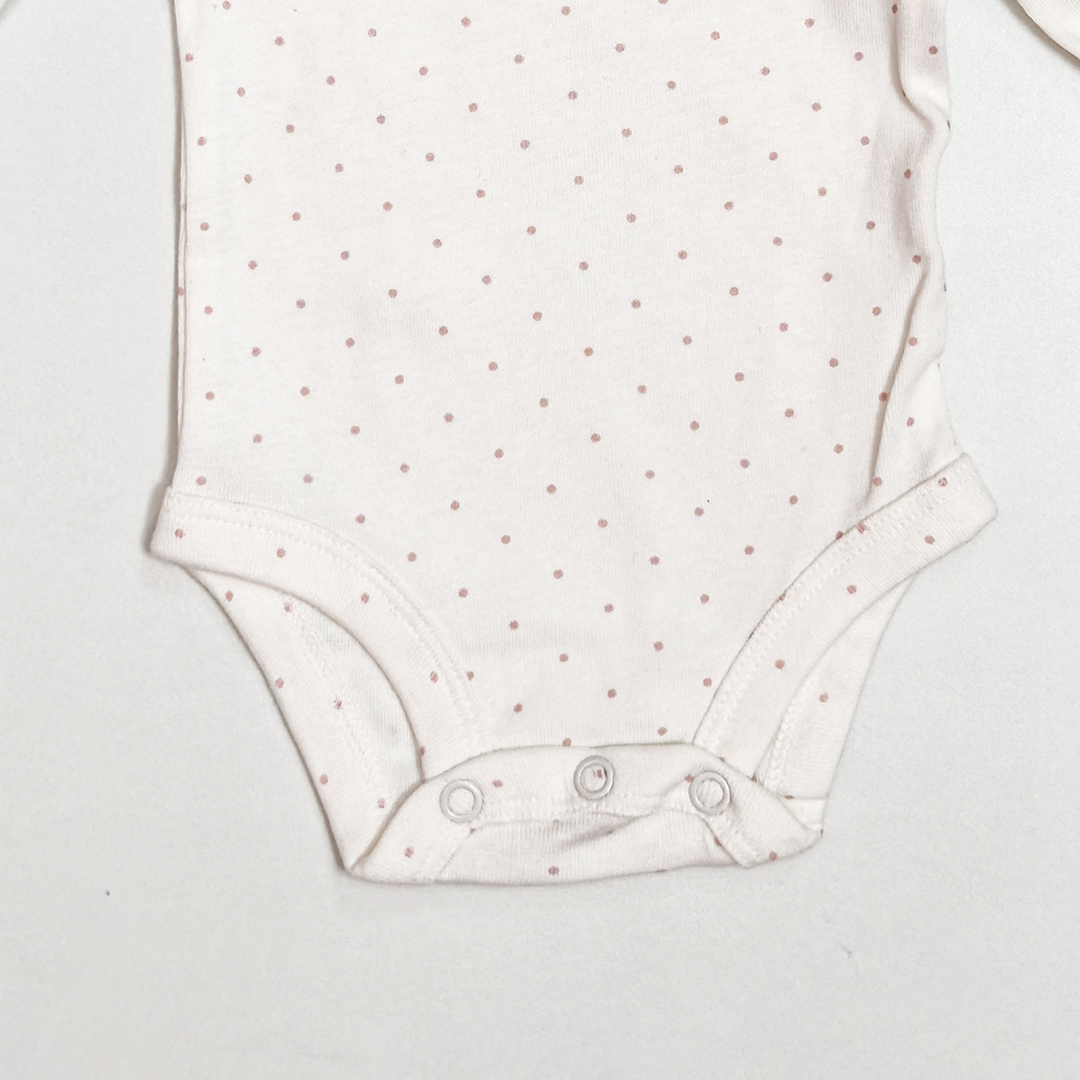 PINK POLKA DOTTED ONESIE