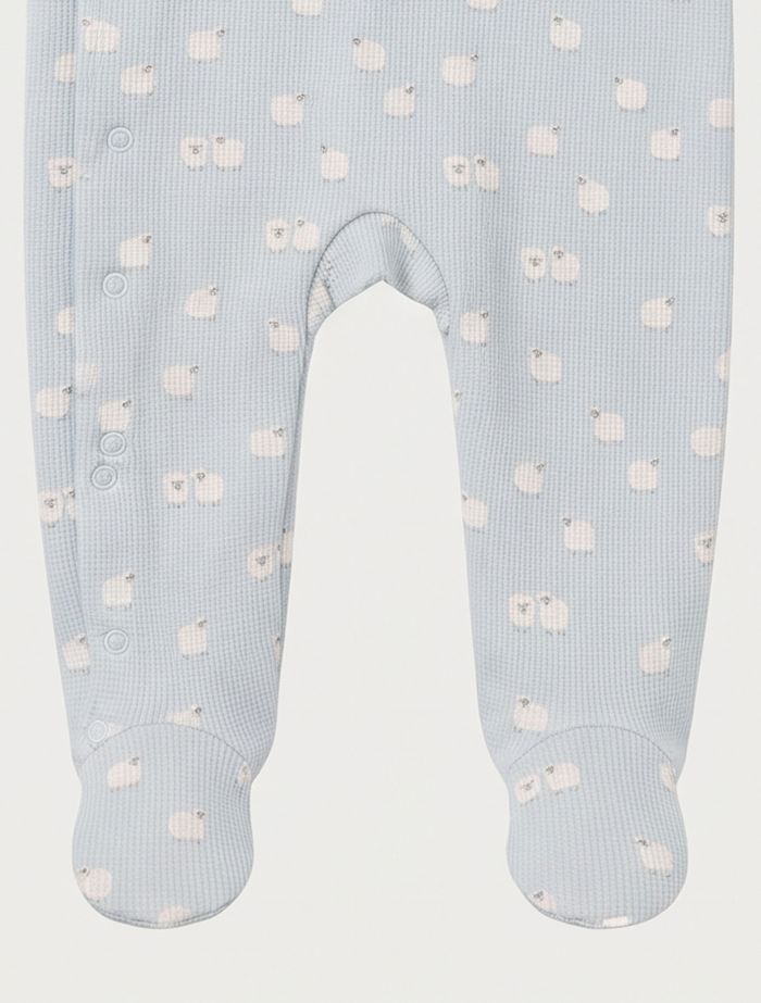 Blue knitted sheep printed sleep suit