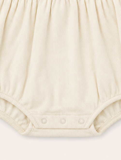 Off white ruffled onesie