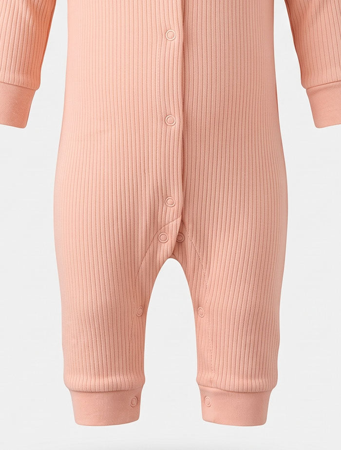 Peach ribbed button romper